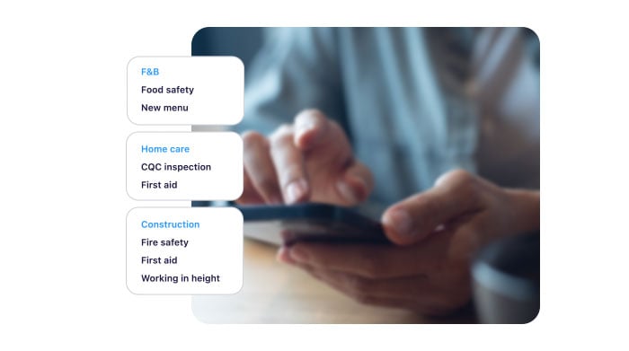 Hand holding phone and clicking on templates